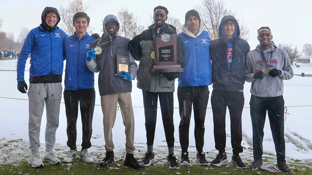 The 2025 Blue Dragon men's cross country team earned their best finish in team history with a national runner-up performance on Saturday in Fort Dodge, Iowa. (Photo by Ed Bailey)